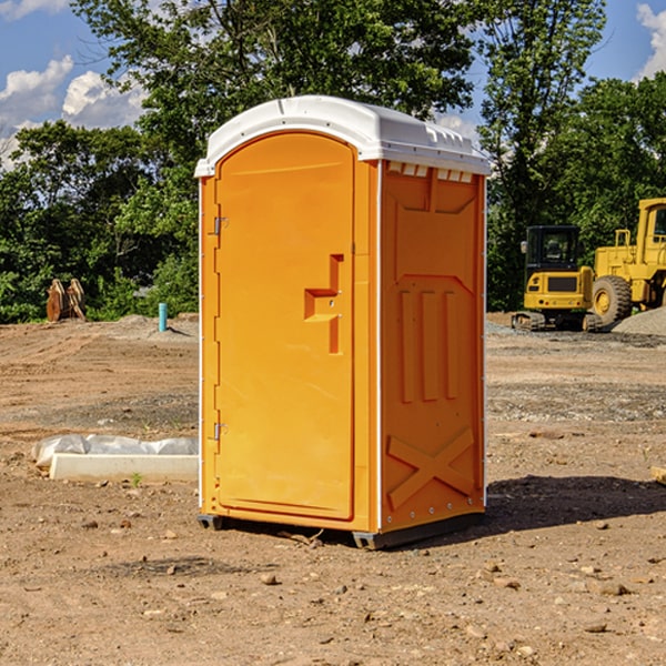 what is the cost difference between standard and deluxe portable toilet rentals in Fontana